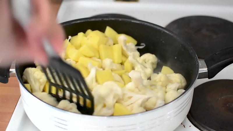 Image of the recipe cooking step-1-5 for Dhaba Style Dry Aloo Gobi - Potato and Cauliflower